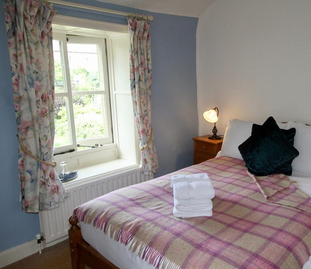 Ashfield House Otel Grassington Dış mekan fotoğraf A bedroom at the Old Post Office